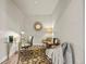 Bright home office offers ample desk space, comfortable seating, and natural light for a productive work environment at 8244 S Queen St, Littleton, CO 80127