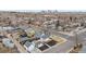 Charming neighborhood aerial view with city skyline in background at 75 S Knox Ct, Denver, CO 80219