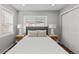 Neutral Primary bedroom features large windows and plush carpeting at 75 S Knox Ct, Denver, CO 80219
