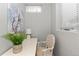 Brightly lit small office area features a stylish chair and modern desk at 75 S Knox Ct, Denver, CO 80219