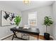 Stylish office with hardwood floors, lots of natural light, and space for plants at 75 S Knox Ct, Denver, CO 80219