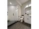 Basement bathroom with a large glass-enclosed shower and hexagon tile floor at 6071 S Oswego St, Greenwood Village, CO 80111