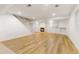 This finished basement offers a modern fireplace and beautiful floors at 13601 Krameria St, Thornton, CO 80602