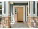 Charming front entrance with a welcoming doormat and stone details at 3329 Molly Ln, Broomfield, CO 80023