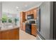 Kitchen with appliances, light countertops, and plenty of cabinet space at 3329 Molly Ln, Broomfield, CO 80023
