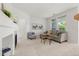 Bright living room with neutral tones, large windows, and comfortable seating at 3329 Molly Ln, Broomfield, CO 80023