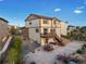 Aerial view of backyard with deck, landscaping, and proximity to nearby park at 7207 S Scottsburg Way, Aurora, CO 80016