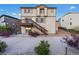 Back exterior of house with deck and stairs to the spacious backyard at 7207 S Scottsburg Way, Aurora, CO 80016