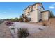 Back of home with a spacious backyard and composite deck with stairs at 7207 S Scottsburg Way, Aurora, CO 80016