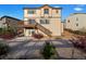Back exterior of house with deck and stairs to the spacious backyard at 7207 S Scottsburg Way, Aurora, CO 80016