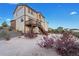 Back of house with deck and spacious backyard featuring easy to maintain landscaping at 7207 S Scottsburg Way, Aurora, CO 80016