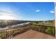 Enjoy community views from this spacious balcony overlooking a lake and several homes at 7207 S Scottsburg Way, Aurora, CO 80016