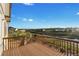 This composite deck offers scenic backyard views of the community park and pond at 7207 S Scottsburg Way, Aurora, CO 80016
