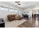 Cozy living room featuring modern decor, piano, and open floor plan at 24906 E Calhoun Pl # C, Aurora, CO 80016