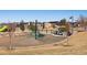 Community playground featuring play structures and a picnic area with views of the neighborhood at 24906 E Calhoun Pl # C, Aurora, CO 80016