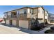 Stylish townhome featuring private balconies, attached garages, and contemporary architecture at 24906 E Calhoun Pl # C, Aurora, CO 80016
