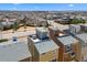 Rooftop view of modern townhomes in a residential area, showcasing neighborhood layout and convenient location at 15732 E Broncos Pl, Englewood, CO 80112