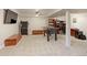 Finished basement with carpeted floors, recessed lighting, and various entertainment amenities at 10538 Quivas St, Northglenn, CO 80234