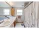 Bright bathroom features double sinks, a large vanity, and neutral decor at 10538 Quivas St, Northglenn, CO 80234