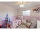 Comfortable ' bedroom with natural light, a ceiling fan, and a cute Minnie Mouse bedspread at 10538 Quivas St, Northglenn, CO 80234