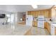 Bright kitchen features a central island and modern appliances at 10538 Quivas St, Northglenn, CO 80234