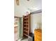 Bedroom featuring a cat ladder up to a loft, natural light, and deck access at 17422 N Canyon Rd, Littleton, CO 80127