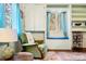 Cozy sitting area with a window seat and built-in shelves for a relaxing retreat at 17422 N Canyon Rd, Littleton, CO 80127