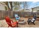 Backyard fire pit with Adirondack chairs, creating a cozy and inviting outdoor gathering space at 331 Chelsea St, Castle Rock, CO 80104