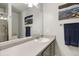 Bright bathroom featuring a vanity with a sink and neutral-toned walls at 331 Chelsea St, Castle Rock, CO 80104