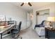 Bedroom with carpet, ceiling fan, a desk, and a comfortable chair at 331 Chelsea St, Castle Rock, CO 80104