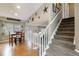 Welcoming foyer leads to dining area and staircase to the upper level at 331 Chelsea St, Castle Rock, CO 80104