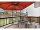 Patio with furniture and a large umbrella, offering a cozy outdoor space at 331 Chelsea St, Castle Rock, CO 80104