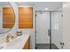 Updated bathroom with white subway tiles and a walk-in shower at 7027 S Madison Way, Centennial, CO 80122