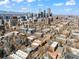 Panoramic aerial view showcasing a vibrant neighborhood with downtown city skyline at 945 N Washington St # 201, Denver, CO 80203