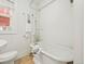 Bathroom with vintage style tub and fixtures with a bright and clean aesthetic at 945 N Washington St # 201, Denver, CO 80203