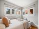 Bright bedroom offers a relaxing retreat with natural light and a cozy, inviting atmosphere at 945 N Washington St # 201, Denver, CO 80203