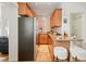 Kitchen area with granite countertops and views of the bathroom and bedroom at 945 N Washington St # 201, Denver, CO 80203
