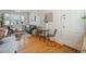 A bright living room showcases hardwood floors, a comfortable green sofa, and a cozy seating area at 945 N Washington St # 201, Denver, CO 80203
