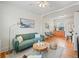 Comfortable living area with hardwood floors and an open layout at 945 N Washington St # 201, Denver, CO 80203