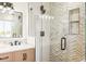 Modern bathroom featuring a glass-enclosed shower with stylish tile work and sleek fixtures at 9232 N Surrey Dr, Castle Rock, CO 80108