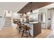 Bright, open kitchen with a large island, stainless steel appliances, and modern fixtures at 9232 N Surrey Dr, Castle Rock, CO 80108
