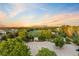 Scenic aerial view of a community park with baseball field and surrounding neighborhood at 3090 W 107 Pl # F, Westminster, CO 80031