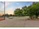 View of a baseball field with a concrete ground and bleachers, perfect for the community at 3090 W 107 Pl # F, Westminster, CO 80031