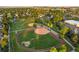 Aerial view of baseball fields with lush green surroundings, perfect for sports enthusiasts and community gatherings at 3090 W 107 Pl # F, Westminster, CO 80031