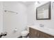 Bathroom has a modern vanity, sink, faucet, mirror, lighting and white walls at 3090 W 107 Pl # F, Westminster, CO 80031
