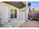 Back patio with wood deck and partial cover with access to the home at 3090 W 107 Pl # F, Westminster, CO 80031