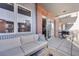 Relaxing balcony space with an outdoor couch, grill, and view of the neighborhood from an elevated position at 1438 Little Raven St # 301, Denver, CO 80202
