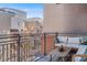 Relax on the outdoor balcony with comfortable seating and views of the city at 1438 Little Raven St # 301, Denver, CO 80202