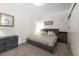 Comfortable bedroom with a gray bed frame, neutral decor, and ample closet space at 1438 Little Raven St # 301, Denver, CO 80202