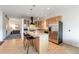 Modern kitchen with stone countertops, stainless steel appliances, and a stylish island at 1438 Little Raven St # 301, Denver, CO 80202